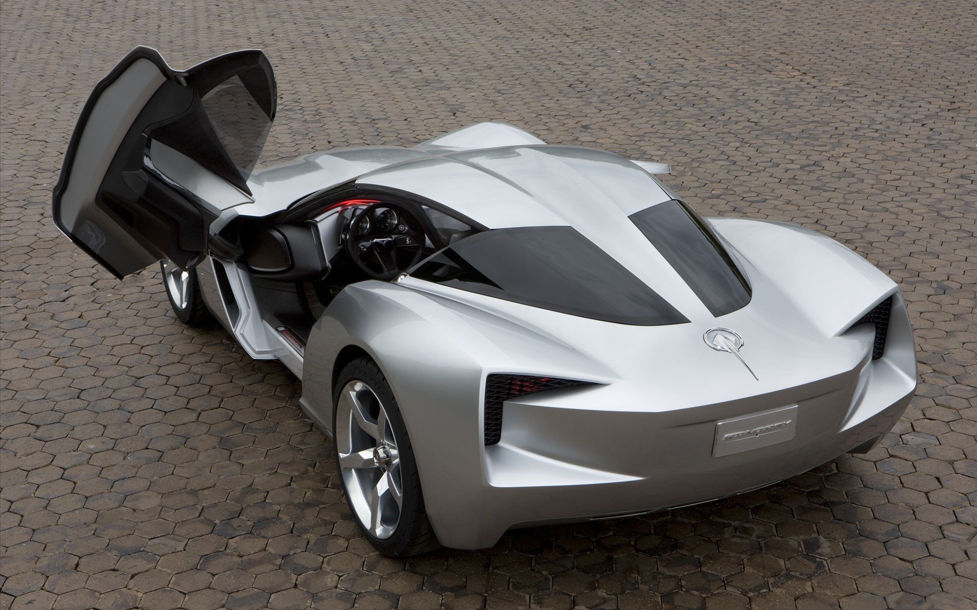 anniversary corvette stingray concept открытая дверца брусчатка площадь серебро спортивные авто транспорт авто автотранспорт