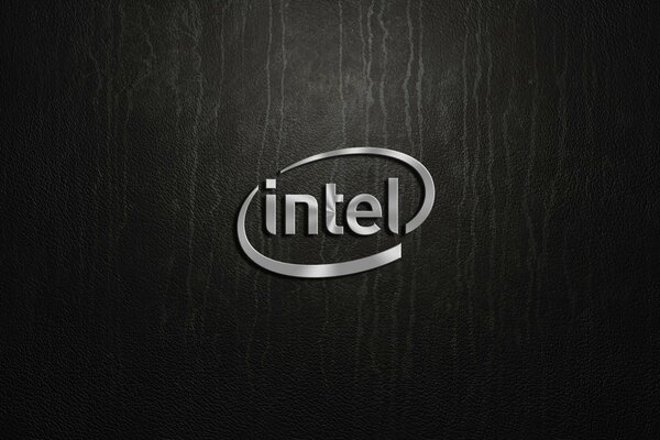 Srebrne logo Intel na ciemnym tle