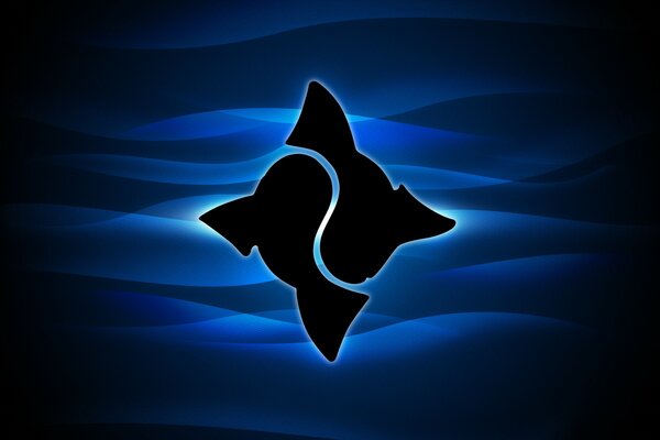 Logo dwa wieloryby na falach