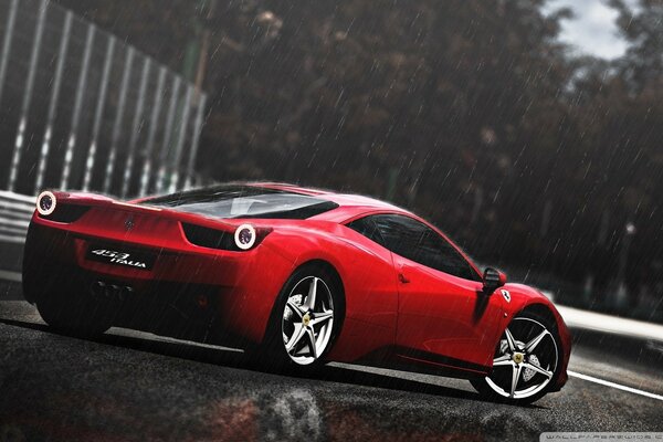 Czerwone Ferrari w pochmurnym pogdowie