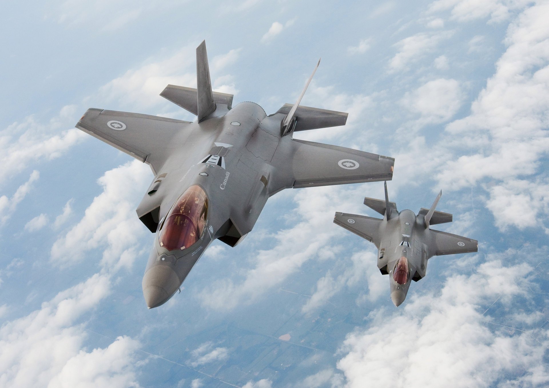 lockheed лайтнинг canada lightning ii канада martin самолет f-35 авиа полет истребитель облака высота скорость военная авиация военная техника авиация
