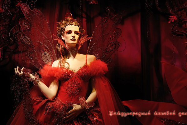 Glamour elegancka dziewczyna w Czerwieni na Masquerade