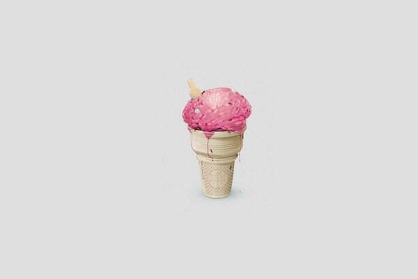 Różowe lody w szklance na jasnym tle