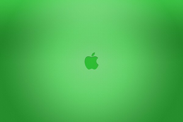 Emblemat apple na zielonym tle