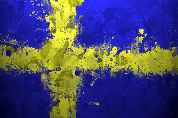 Flaga Szwecji namalowana szerokimi pociągnięciami pędzla
