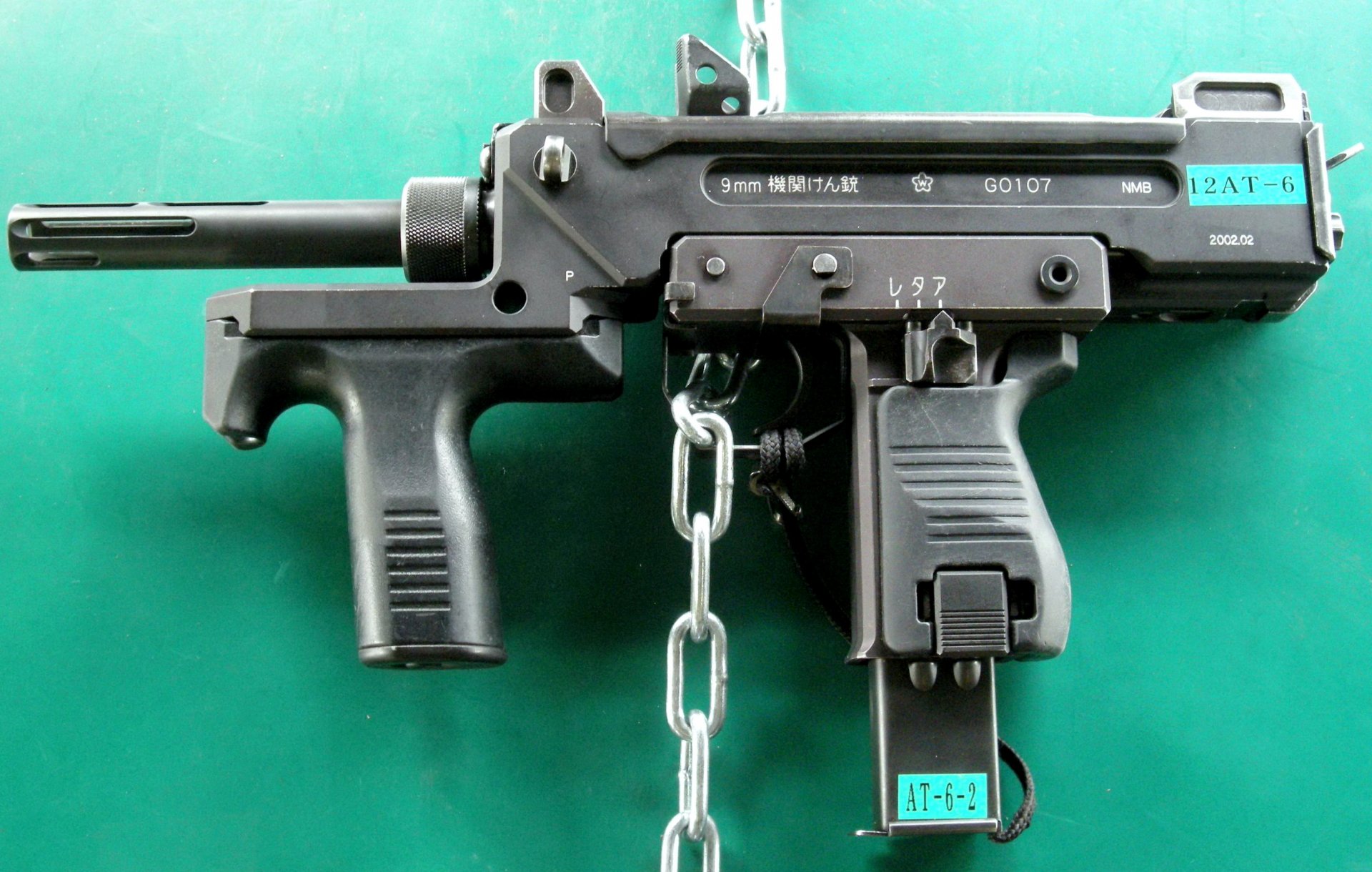 компактный пистолет-пулемет японское оружие minebea лс-9 9 мм япония machine pistol пистолет 機関拳銃 kyumiri кикан kenjū длина 399мм вес 8кг магазина патронов 9х19 мм темп стрельбы выстрелов минуту начальная скорость пули 1100м.сек у