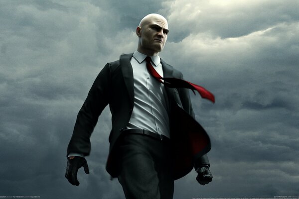 Наёмный убийца hitman в перчатках и в пиджаке